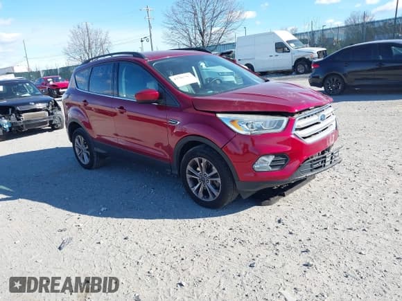 ✅ 2018 Ford Escape SEL • VIN: 1FMCU9HD4JUB03036 • Lot: 43702583. Wystawiony na IAAI z przebiegiem 101 312 mil. Bezpłatny archiwum sprzedaży aukcyjnych z USA i szczegółowy raport historii pojazdu na DreamBid. Zdjęcie 1.