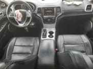 ✅ 2018 Jeep Grand Cherokee Summit • VIN: 1C4RJFJGXJC347502 • Lot: 52486975. Listed on Copart with 100,503 mi. Free auction sales archive from the USA and detailed vehicle history report at DreamBid. Image 8.