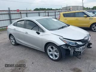 ✅ 2018 Chevrolet Cruze Premier • VIN: 1G1BF5SM3J7194870 • Lot: 42567917. Listed on IAAI with 123,679 mi. Free auction sales archive from the USA and detailed vehicle history report at DreamBid. Image 1.