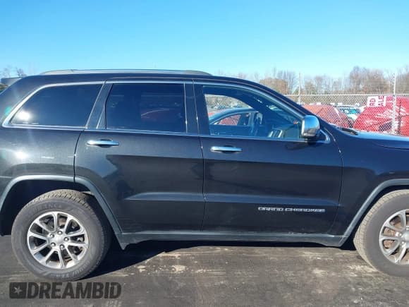 ✅ 2015 Jeep Grand Cherokee Limited • VIN: 1C4RJFBGXFC725064 • Lot: 43832675. Wystawiony na IAAI z przebiegiem 84 476 mil. Bezpłatny archiwum sprzedaży aukcyjnych z USA i szczegółowy raport historii pojazdu na DreamBid. Zdjęcie 13.