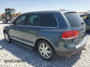 ✅ 2006 Volkswagen Touareg • VIN: WVGPT77LX6D056538 • Lot: 51330225. Listed on Copart with 183,060 mi. Free auction sales archive from the USA and detailed vehicle history report at DreamBid. Image 2.