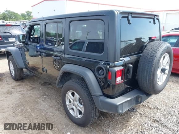 ✅ 2023 Jeep Wrangler Sport S • VIN: 1C4HJXDN6PW599895 • Lot: 42242107. Wystawiony na IAAI z przebiegiem 53 980 mil. Bezpłatny archiwum sprzedaży aukcyjnych z USA i szczegółowy raport historii pojazdu na DreamBid. Zdjęcie 3.