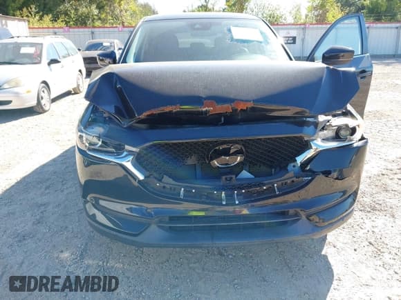 ✅ 2018 Mazda CX-5 Touring • VIN: JM3KFACM8J1432351 • Lot: 43385726. Listed on IAAI with 40,909 mi. Free auction sales archive from the USA and detailed vehicle history report at DreamBid. Image 6.