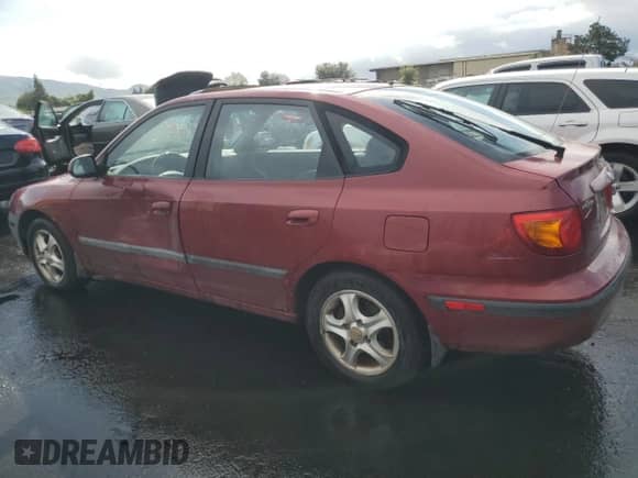 2002 Hyundai Elantra GT z VIN KMHDN55D52U068507, wystawiony jako Copart lot #50656835 z przebiegiem 201 909 mil mil oraz Szkoda całkowita • Salvage title. Historia ofert i sprzedaży dostępna na DreamBid. Obrazek 2.