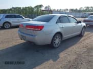 ✅ 2010 Lincoln MKZ • VIN: 3LNHL2GC4AR608669 • Lot: 42198042. Listed on IAAI with 122,715 mi. Free auction sales archive from the USA and detailed vehicle history report at DreamBid. Image 4.