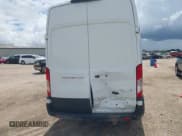 ✅ 2023 Ford Transit Cargo • VIN: 1FTBR3X83PKA70005 • Lot: 42949959. Listed on IAAI with 53,215 mi. Free auction sales archive from the USA and detailed vehicle history report at DreamBid. Image 16.