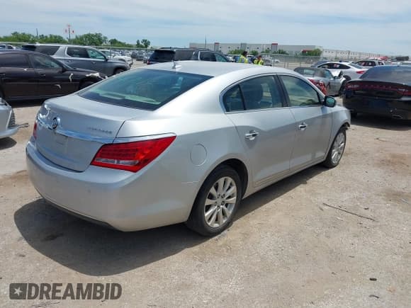 ✅ 2014 Buick LaCrosse Leather • VIN: 1G4GB5GR6EF244567 • Лот: 42314562. Опубликован ранее на IAAI с пробегом 184 472 миль. Бесплатный доступ к архиву аукционных продаж из США и подробный отчёт об истории автомобиля на DreamBid. Изображение 4.