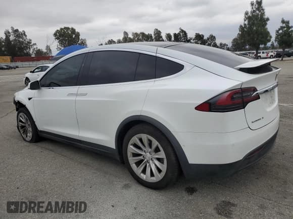 ✅ 2018 Tesla Model X 75D • VIN: 5YJXCAE26JF111662 • Lot: 54129765. Listed on Copart with 88,553 mi. Free auction sales archive from the USA and detailed vehicle history report at DreamBid. Image 2.