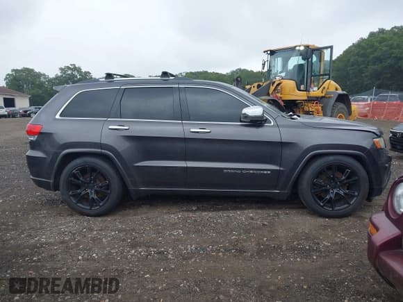 ✅ 2014 Jeep Grand Cherokee Overland • VIN: 1C4RJFCT5EC137468 • Lot: 43254198. Listed on IAAI with Not provided. Free auction sales archive from the USA and detailed vehicle history report at DreamBid. Image 12.