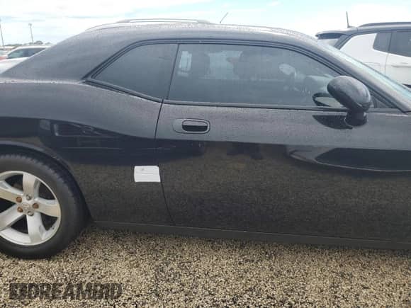2009 Dodge Challenger SE z VIN 2B3LJ44V09H604858, wystawiony jako Copart lot #74292034 z przebiegiem Nie podano mil oraz Szkoda całkowita • Salvage title. Historia ofert i sprzedaży dostępna na DreamBid. Obrazek 12.
