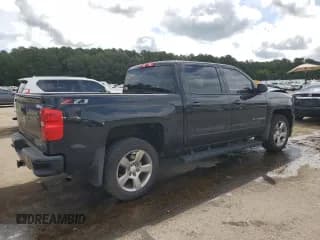 ✅ 2018 Chevrolet Silverado 1500 LT • VIN: 3GCUKREC7JG571095 • Лот: 69319874. Опубликован ранее на Copart с пробегом 159 306 миль. Бесплатный доступ к архиву аукционных продаж из США и подробный отчёт об истории автомобиля на DreamBid. Изображение 3.
