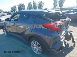 ✅ 2019 Toyota C-HR LE • VIN: JTNKHMBX0K1032362 • Лот: 43733664. Опубликован ранее на IAAI с пробегом 96 486 миль. Бесплатный доступ к архиву аукционных продаж из США и подробный отчёт об истории автомобиля на DreamBid. Изображение 3.