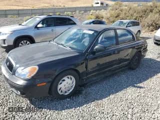 2003 Hyundai Sonata с VIN KMHWF25H23A900539, выставлен на аукционе Copart как лот 80395215 с пробегом 156 850 миль миль и Списание • Salvage title. История ставок и продаж доступна на DreamBid. Изображение 1.