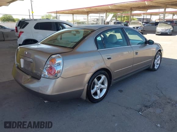 ✅ 2005 Nissan Altima SE • VIN: 1N4BL11D65C144140 • Лот: 42861926. Опубликован ранее на IAAI с пробегом 144 609 миль. Бесплатный доступ к архиву аукционных продаж из США и подробный отчёт об истории автомобиля на DreamBid. Изображение 4.