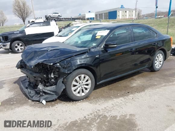 ✅ 2015 Volkswagen Passat Limited Edition • VIN: 1VWAT7A34FC042592 • Lot: 41825242. Listed on IAAI with 160,118 mi. Free auction sales archive from the USA and detailed vehicle history report at DreamBid. Image 2.