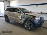 ✅ 2015 Jeep Grand Cherokee Overland • VIN: 1C4RJFCG7FC673181 • Lot: 46527875. Listed on Copart with 124,503 mi. Free auction sales archive from the USA and detailed vehicle history report at DreamBid. Image 4.