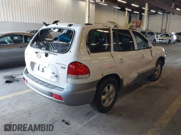2005 Hyundai Santa Fe GLS z VIN KM8SC73E75U025683, wystawiony jako IAAI lot #40863700 z przebiegiem 129 970 mil mil oraz . Historia ofert i sprzedaży dostępna na DreamBid. Obrazek 4.
