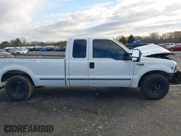 ✅ 1999 Ford F-250 XL • VIN: 1FTNX20F5XEC00435 • Lot: 41137317. Listed on IAAI with 346,348 mi. Free auction sales archive from the USA and detailed vehicle history report at DreamBid. Image 13.