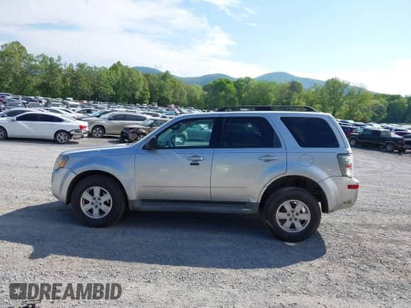 2010 Mercury Mariner with VIN 4M2CN9BG0AKJ21754, listed as a IAAI auction lot 42192286 with 196,749 mi miles and . Bid and sale history available at DreamBid. Image 15.