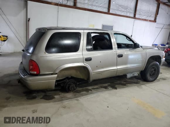 ✅ 1999 Dodge Durango • VIN: 1B4HS28Y3XF548677 • Лот: 90792215. Опубликован ранее на Copart с пробегом Не указан. Бесплатный доступ к архиву аукционных продаж из США и подробный отчёт об истории автомобиля на DreamBid. Изображение 3.