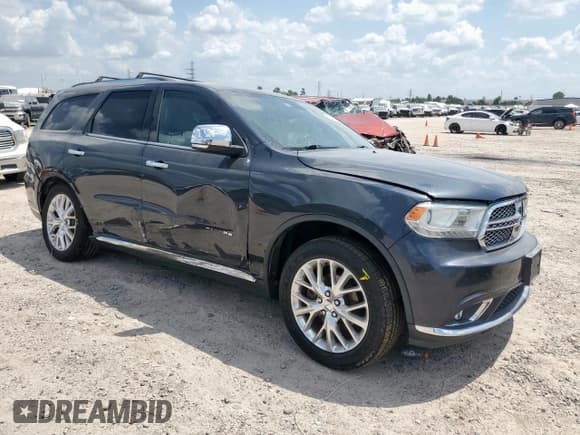 ✅ 2014 Dodge Durango Citadel • VIN: 1C4SDHET7EC975969 • Lot: 70704055. Listed on Copart with 159,802 mi. Free auction sales archive from the USA and detailed vehicle history report at DreamBid. Image 4.