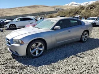 ✅ 2014 Dodge Charger SXT Plus • VIN: 2C3CDXHG6EH135115 • Lot: 50099215. Listed on Copart with 336,812 mi. Free auction sales archive from the USA and detailed vehicle history report at DreamBid. Image 1.