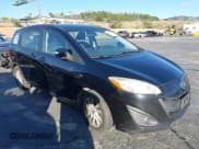 ✅ 2013 Mazda 5 Sport • VIN: JM1CW2BLXD0159953 • Lot: 43851663. Listed on IAAI with 154,906 mi. Free auction sales archive from the USA and detailed vehicle history report at DreamBid. Image 1.