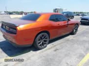 ✅ 2021 Dodge Challenger SXT • VIN: 2C3CDZAGXMH604789 • Lot: 39184065. Wystawiony na IAAI z przebiegiem 32 196 mil. Bezpłatny archiwum sprzedaży aukcyjnych z USA i szczegółowy raport historii pojazdu na DreamBid. Zdjęcie 4.
