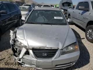 2006 Hyundai Elantra GLS z VIN KMHDN46D16U365627, wystawiony jako Copart lot #72944324 z przebiegiem 154 943 mil mil oraz Szkoda całkowita • Salvage title. Historia ofert i sprzedaży dostępna na DreamBid. Obrazek 5.