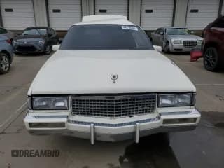 ✅ 1990 Cadillac Fleetwood • VIN: 1G6CB5332L4248633 • Лот: 44218444. Опубликован ранее на Copart с пробегом 40 635 миль. Бесплатный доступ к архиву аукционных продаж из США и подробный отчёт об истории автомобиля на DreamBid. Изображение 5.