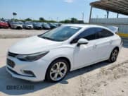 ✅ 2018 Chevrolet Cruze Premier • VIN: 1G1BF5SM0J7112268 • Lot: 84574725. Listed on Copart with 112,571 mi. Free auction sales archive from the USA and detailed vehicle history report at DreamBid. Image 1.