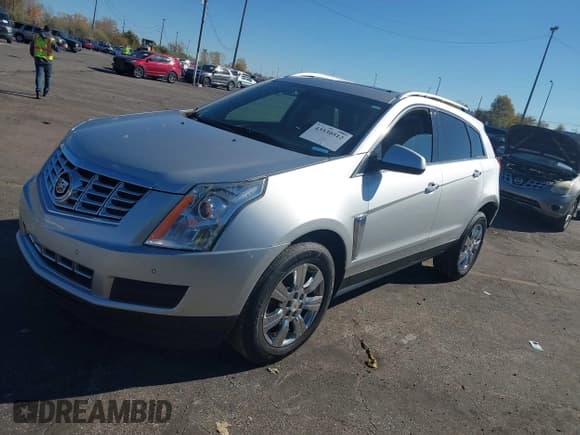 ✅ 2014 Cadillac SRX Luxury Collection • VIN: 3GYFNEE38ES532361 • Lot: 43530512. Listed on IAAI with 112,815 mi. Free auction sales archive from the USA and detailed vehicle history report at DreamBid. Image 2.