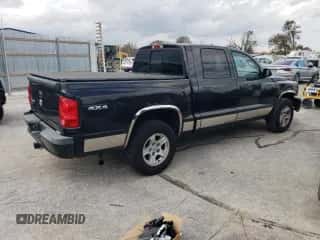 2008 Dodge Dakota SLT с VIN 1D7HW48KX8S594178, выставлен на аукционе Copart как лот 77591894 с пробегом 191 262 миль миль и Списание • Salvage title. История ставок и продаж доступна на DreamBid. Изображение 3.