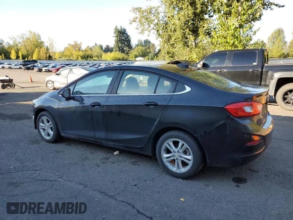 2018 Chevrolet Cruze LT z VIN 1G1BE5SM9J7224392, wystawiony jako Copart lot #82199325 z przebiegiem 156 330 mil mil oraz Szkoda całkowita • Salvage title. Historia ofert i sprzedaży dostępna na DreamBid. Obrazek 2.