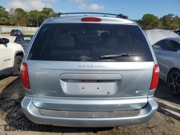 2005 Dodge Caravan SXT с VIN 1D4GP45R85B380101, выставлен на аукционе Copart как лот 77202344 с пробегом 185 107 миль миль и Списание • Salvage title. История ставок и продаж доступна на DreamBid. Изображение 6.