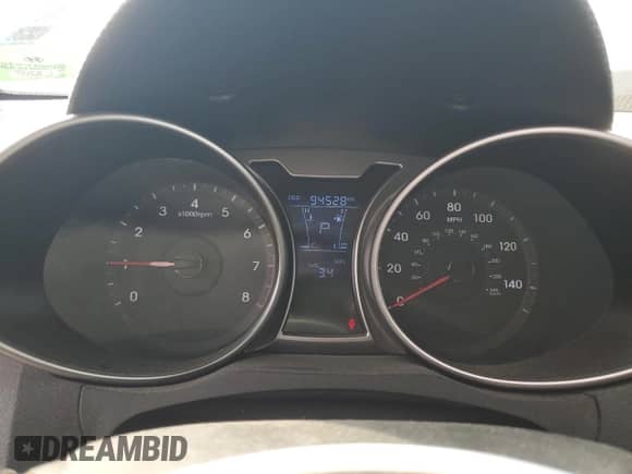 2012 Hyundai Veloster w/Red Int с VIN KMHTC6AD8CU042093, выставлен на аукционе Copart как лот 71263784 с пробегом 94 528 миль миль и Чистый • Clean title. История ставок и продаж доступна на DreamBid. Изображение 9.