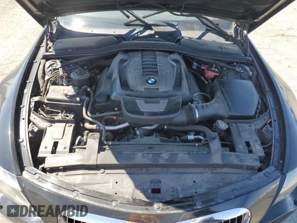 ✅ 2006 BMW 6 Series 650Ci • VIN: WBAEK13496CN78400 • Lot: 64634235. Wystawiony na Copart z przebiegiem 129 891 mil. Bezpłatny archiwum sprzedaży aukcyjnych z USA i szczegółowy raport historii pojazdu na DreamBid. Zdjęcie 11.