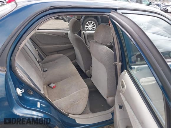 ✅ 1999 Toyota Corolla VE • VIN: 1NXBR12E7XZ192769 • Lot: 41825479. Listed on IAAI with 143,378 mi. Free auction sales archive from the USA and detailed vehicle history report at DreamBid. Image 8.