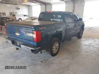 ✅ 2015 Chevrolet Silverado 1500 LT • VIN: 3GCUKREC5FG477885 • Lot: 42972115. Wystawiony na IAAI z przebiegiem 173 409 mil. Bezpłatny archiwum sprzedaży aukcyjnych z USA i szczegółowy raport historii pojazdu na DreamBid. Zdjęcie 4.