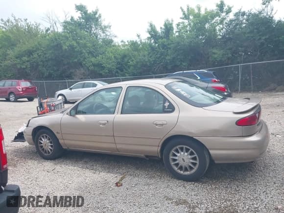 ✅ 1999 Ford Contour LX • VIN: 1FAFP6538XK135792 • Lot: 42443631. Listed on IAAI with 74,481 mi. Free auction sales archive from the USA and detailed vehicle history report at DreamBid. Image 15.