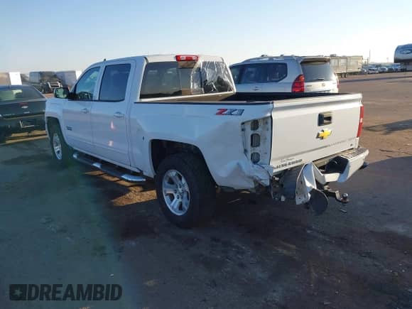 2018 Chevrolet Silverado 1500 LT с VIN 3GCUKREC4JG540242, выставлен на аукционе IAAI как лот 43319652 с пробегом 59 477 миль миль и . История ставок и продаж доступна на DreamBid. Изображение 3.