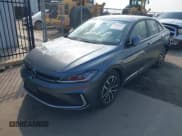 ✅ 2025 Volkswagen Jetta SE • VIN: 3VW7X7BU4SM086946 • Lot: 43058461. Listed on IAAI with 1,261 mi. Free auction sales archive from the USA and detailed vehicle history report at DreamBid. Image 2.