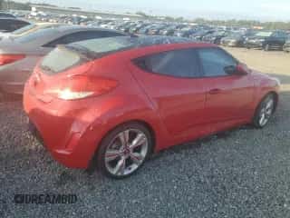 2013 Hyundai Veloster w/Black Int z VIN KMHTC6AD1DU119193, wystawiony jako Copart lot #73733224 z przebiegiem Nie podano mil oraz Szkoda całkowita • Salvage title. Historia ofert i sprzedaży dostępna na DreamBid. Obrazek 3.