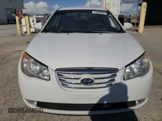 2010 Hyundai Elantra GLS z VIN KMHDU4ADXAU898580, wystawiony jako Copart lot #76984854 z przebiegiem 124 425 mil mil oraz Szkoda całkowita • Salvage title. Historia ofert i sprzedaży dostępna na DreamBid. Obrazek 5.