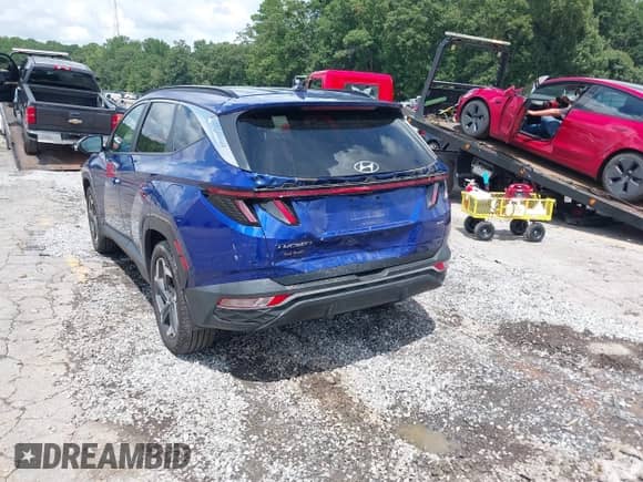 2023 Hyundai Tucson SEL z VIN 5NMJFCAE4PH196713, wystawiony jako IAAI lot #42949944 z przebiegiem 22 921 mil mil oraz . Historia ofert i sprzedaży dostępna na DreamBid. Obrazek 3.