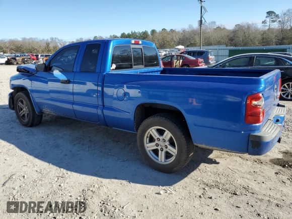 2008 Dodge Dakota Bighorn/Lonestar with VIN 1D7HE32K08S590579, listed as a Copart auction lot 85848484 with 143,435 mi miles and Salvage title. Bid and sale history available at DreamBid. Image 2.