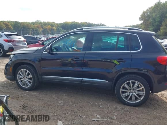 ✅ 2013 Volkswagen Tiguan S • VIN: WVGBV3AX3DW581578 • Lot: 43475484. Listed on IAAI with 142,053 mi. Free auction sales archive from the USA and detailed vehicle history report at DreamBid. Image 14.