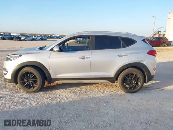 2018 Hyundai Tucson Limited with VIN KM8J33A23JU756084, listed as a IAAI auction lot 41107627 with Not provided miles and . Bid and sale history available at DreamBid. Image 13.