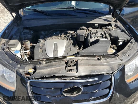 ✅ 2011 Hyundai Santa Fe SE • VIN: 5XYZHDAG5BG014279 • Lot: 87061945. Listed on Copart with 118,406 mi. Free auction sales archive from the USA and detailed vehicle history report at DreamBid. Image 12.