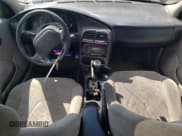 ✅ 2001 Saturn SC • VIN: 1G8ZR12731Z256766 • Лот: 70595904. Опубликован ранее на Copart с пробегом Не указан. Бесплатный доступ к архиву аукционных продаж из США и подробный отчёт об истории автомобиля на DreamBid. Изображение 8.